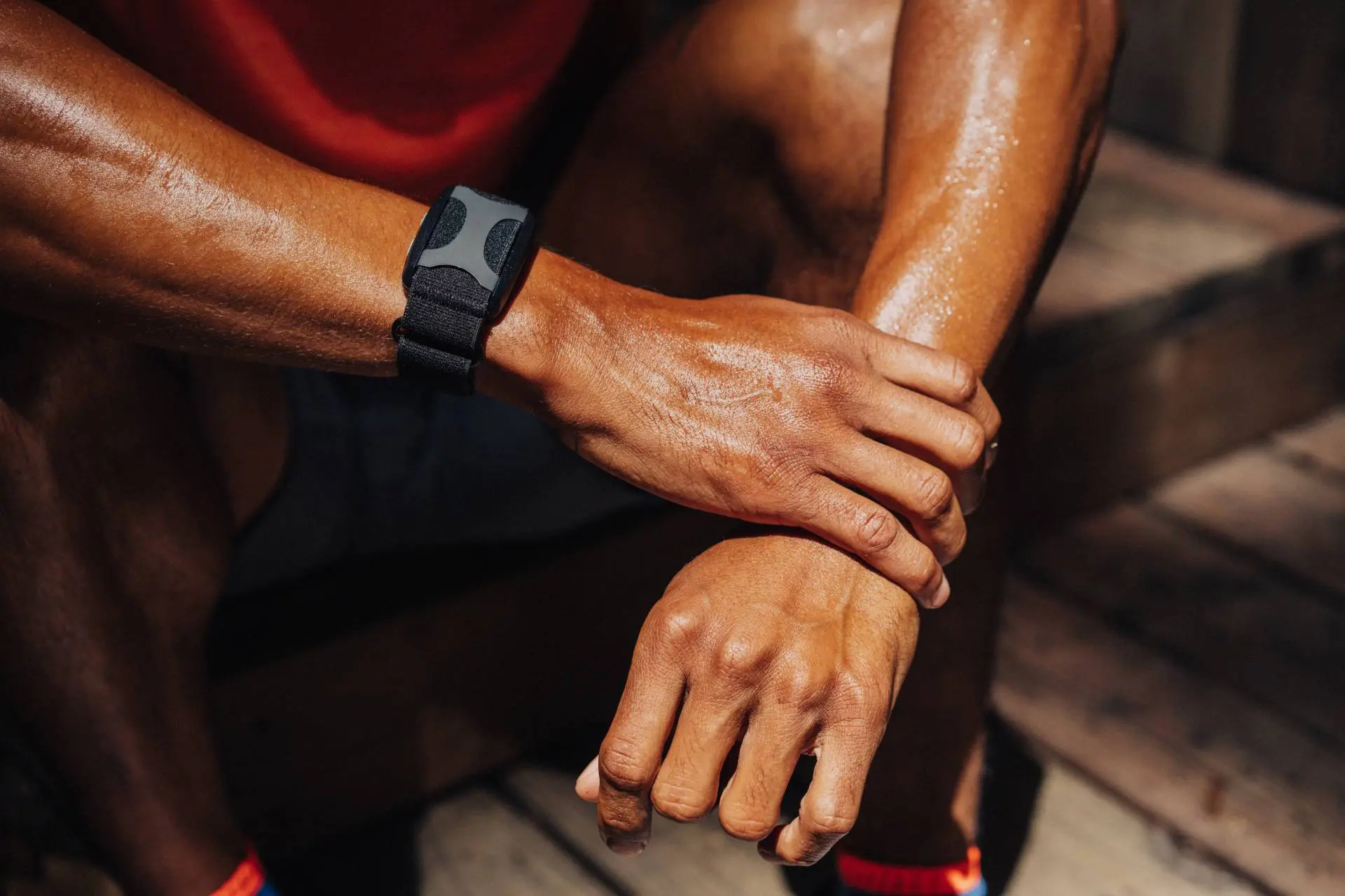 Man wearing Apollo Neuro burnout prevention device